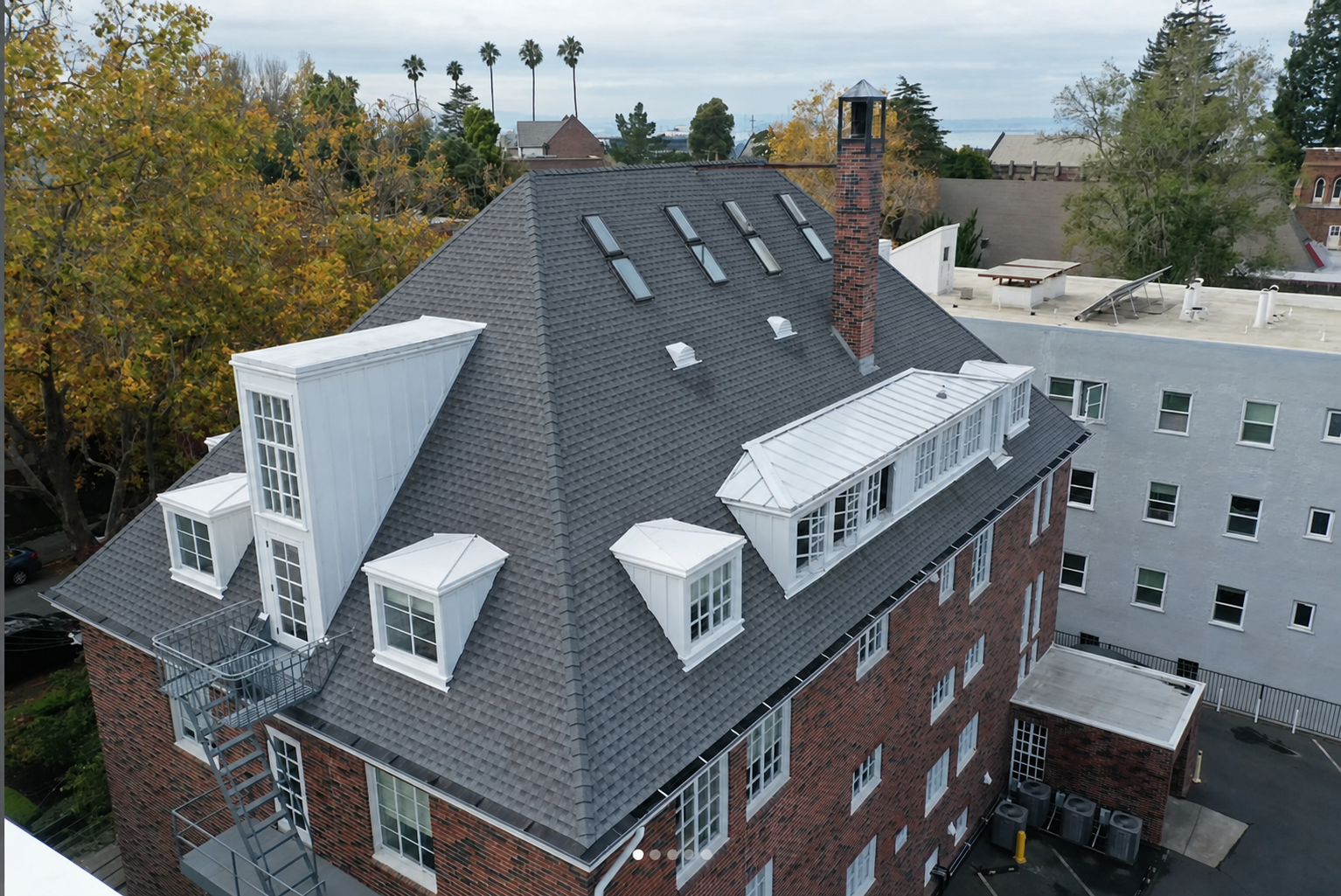 Completed steep-slope institutional roof